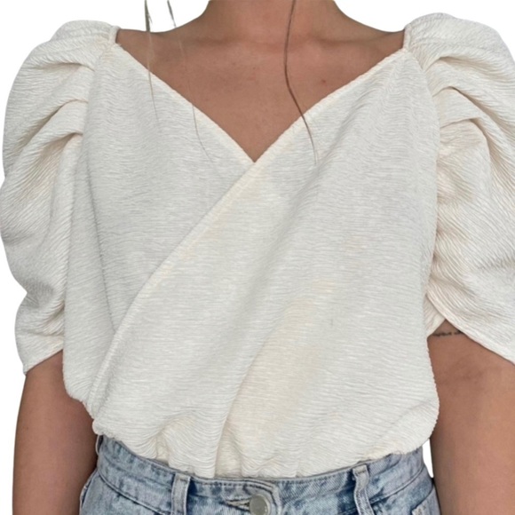 Express Tops - Express Ivory Bodysuit With Dramatic Sleeves size M